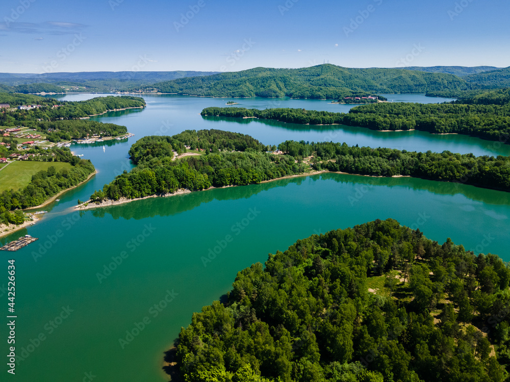 Fototapeta premium Summer at Solina Lake in Bieszczady Mountains Park, Poland. Aerial Drone View. Summer Day, Turquoise Water.