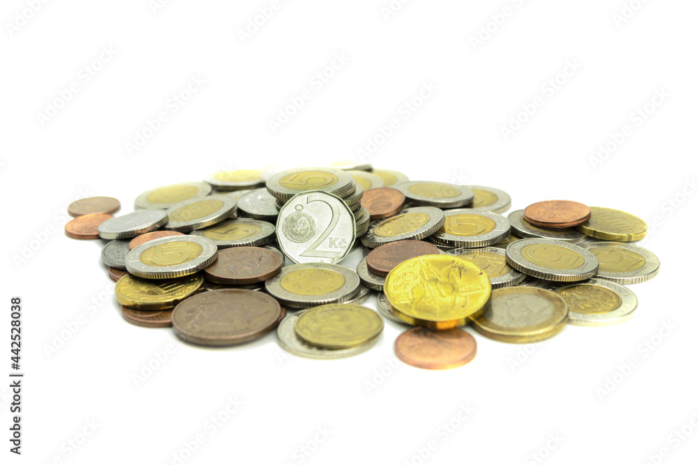 Coins of different countries and different denominations on a white background Coins of different countries and different denominations on a white background