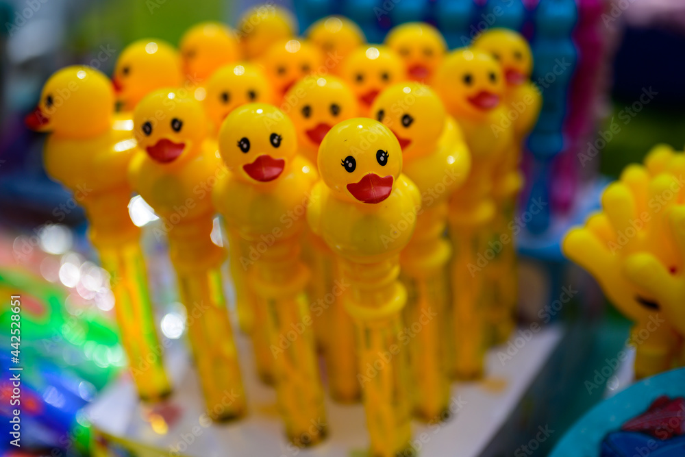 Fototapeta premium Many toys yellow plastic ducks