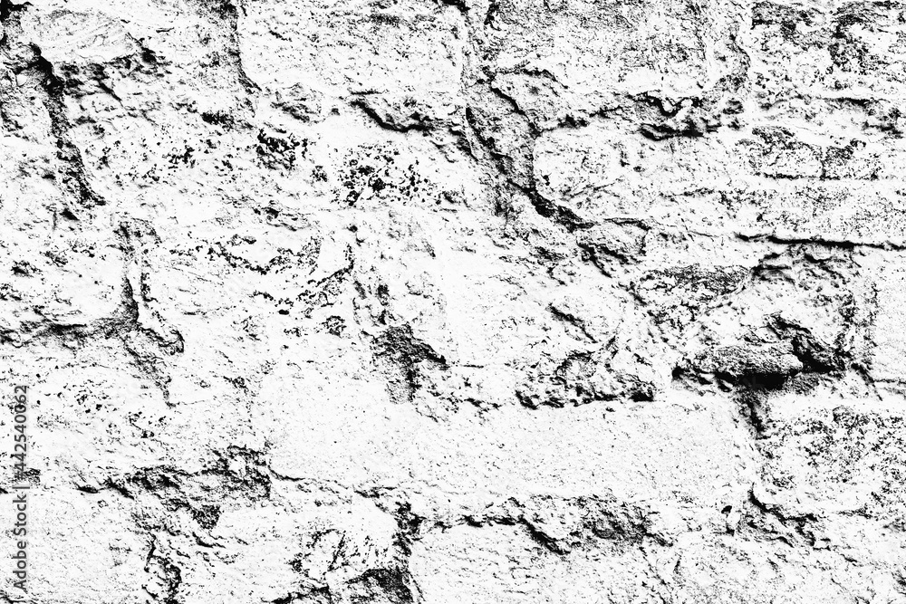 Fototapeta premium Texture of a brick wall with cracks and scratches which can be used as a background