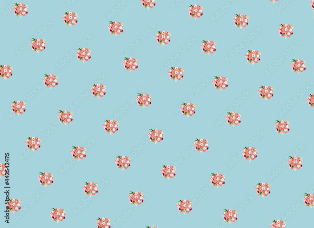 Creative pattern with brain and colorful flowers over blue pastel background. Minimal flat lay concept about mental health. Creative pattern with brain and colorful flowers over blue pastel background. Minimal flat lay concept about mental health.
