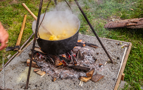 Romanian traditional food prepared at the cauldron on the open fire