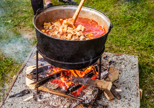 Romanian traditional food prepared at the cauldron on the open fire