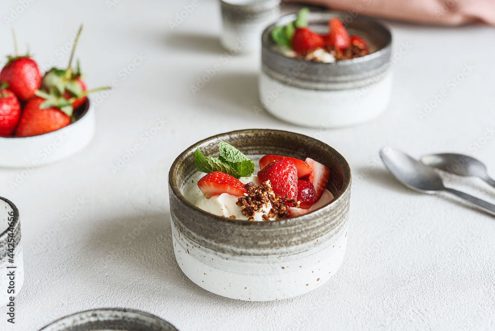 Strawberry, cream cheese and feta cream and crumble crust dessert. Homemade Sweet and salty cheesecake. Trifle. Selective focus Strawberry, cream cheese and feta cream and crumble crust dessert. Homemade Sweet and salty cheesecake. Trifle. Selective focus