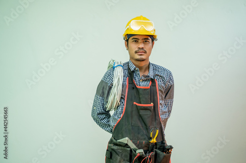 Electrician working and checking production process at the construction site,Engineer,Construction concept.