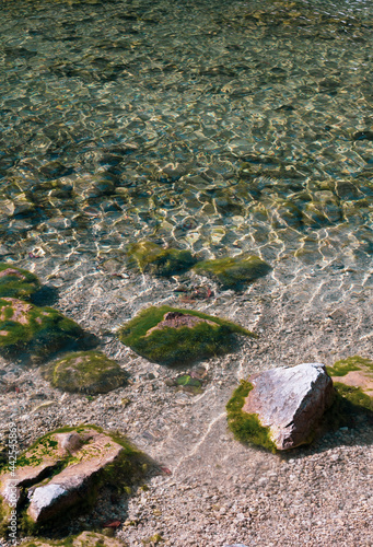 Clear water and stones at Königssee in Bavaria, Germany