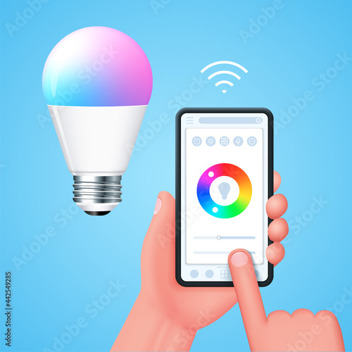 Mobile phone and smart led lightbulb. Adjusting a smart lamp using a smartphone. A phone application used to control a smart lamp in a smart home system. Lamp and smartphone with user interface via Wi