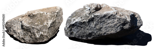 Two stones with hard shadows isolated on white background. Big granite rock stone. Rock stone is an ordinary cobblestone isolated on a white background.