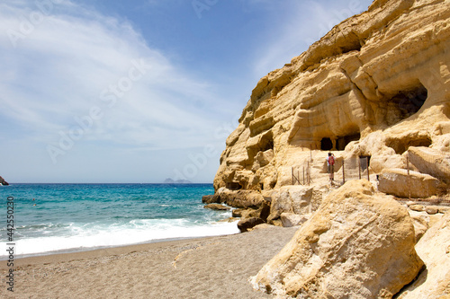 A seaside cliff with caves in Matala, Crete, Greece, landscape orientation
