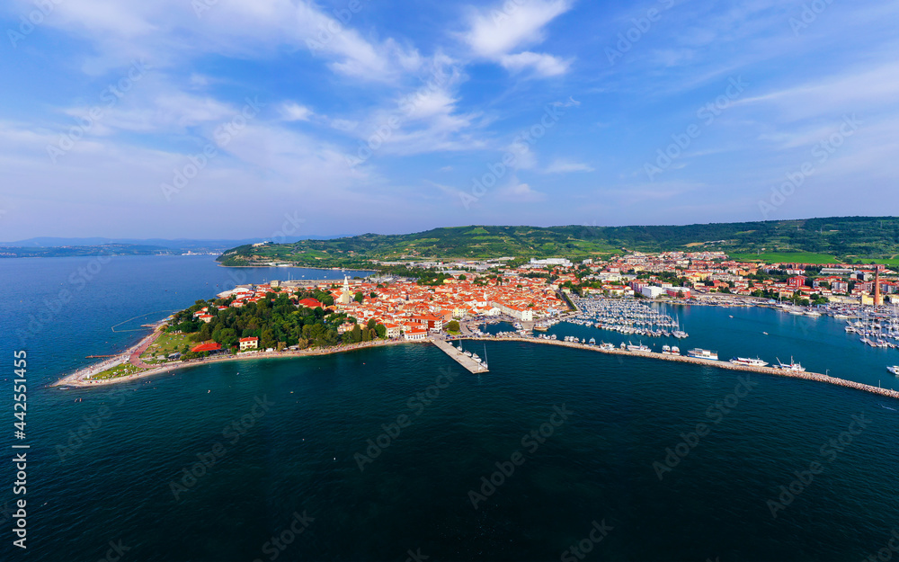 Fototapeta premium Aerial cityscape about Izola town Slovenia. Unique mediterranic cute little town in adriatic sea near by Piran city.