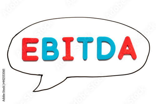 Alphabet letter with word EBITDA (abbreviation of earnings before interest, taxes, depreciation and amortization) in black line hand drawing as bubble speech on white board background