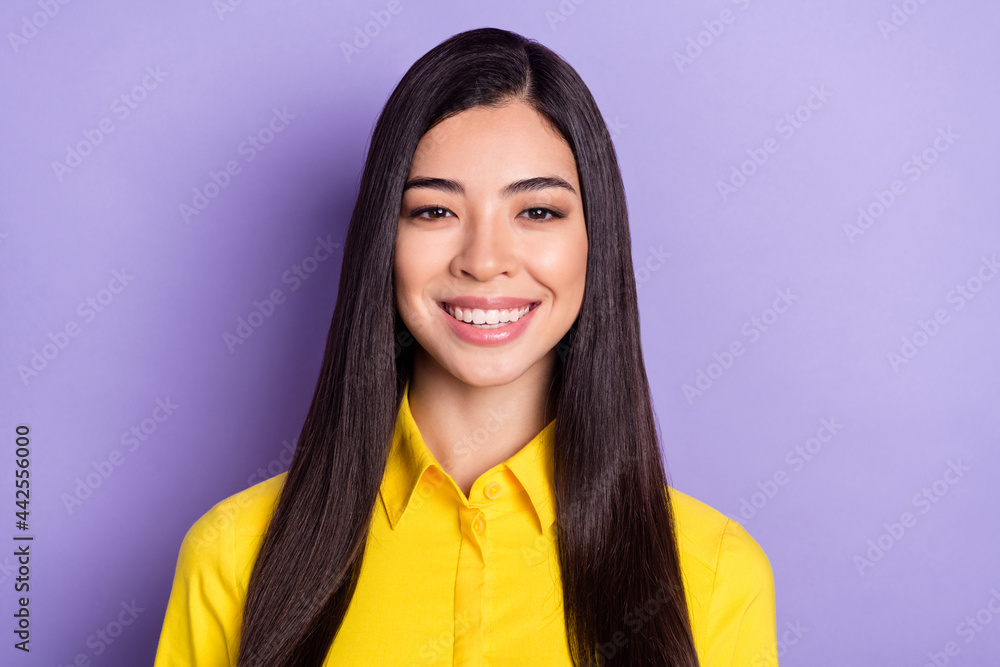 Photo of beautiful brown hairdo young hr lady wear yellow shirt isolated on purple color background Photo of beautiful brown hairdo young hr lady wear yellow shirt isolated on purple color background