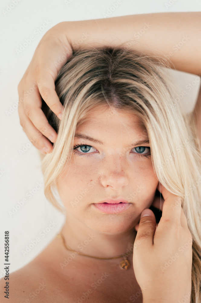 Naklejka premium Gorgeous plus size young girl on white background. Concept of body positivity
