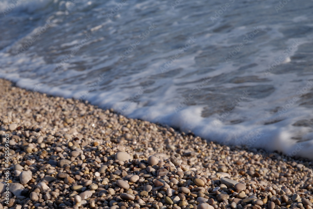 close up shot with small stones at beach close up shot with small stones at beach