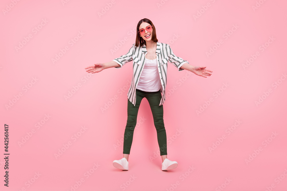 Full body photo of young girl happy positive smile open arms hug cuddle welcome isolated over pastel color background Full body photo of young girl happy positive smile open arms hug cuddle welcome isolated over pastel color background