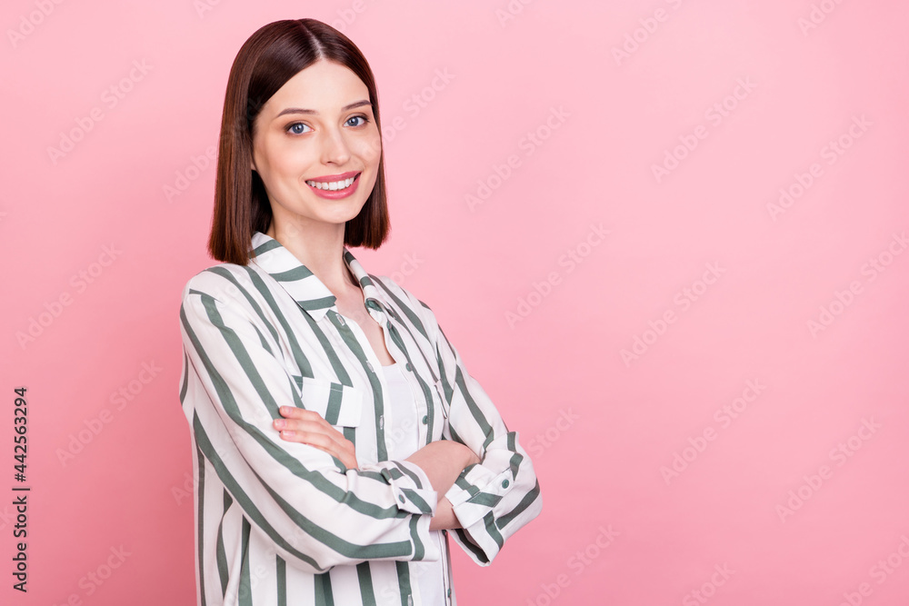 Profile side photo of young business woman happy positive smile confident crossed hands isolated over pink color background Profile side photo of young business woman happy positive smile confident crossed hands isolated over pink color background