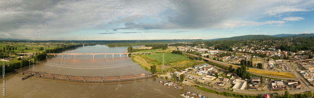 Aerial Panoramic View of Fraser River, Bridge and Mission City. Located East of Vancouver, British Columbia, Canada.