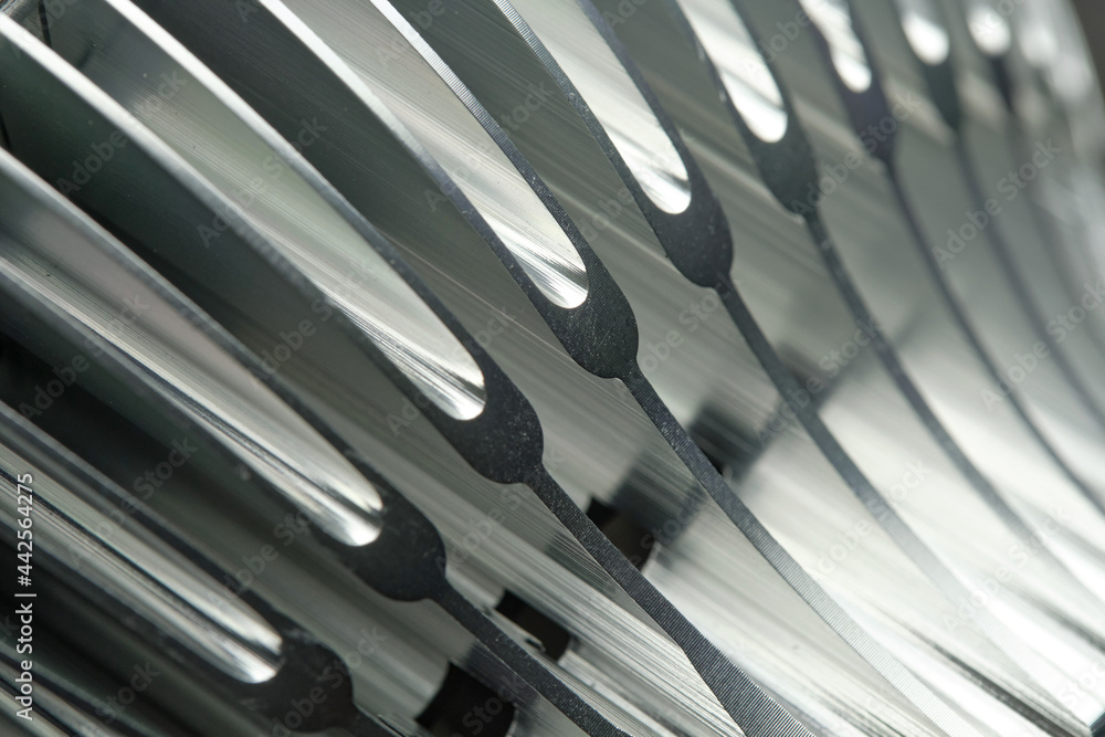 LED phytolamp for growing seedlings. Aluminum cooling fins, close-up. LED phytolamp for growing seedlings. Aluminum cooling fins, close-up.