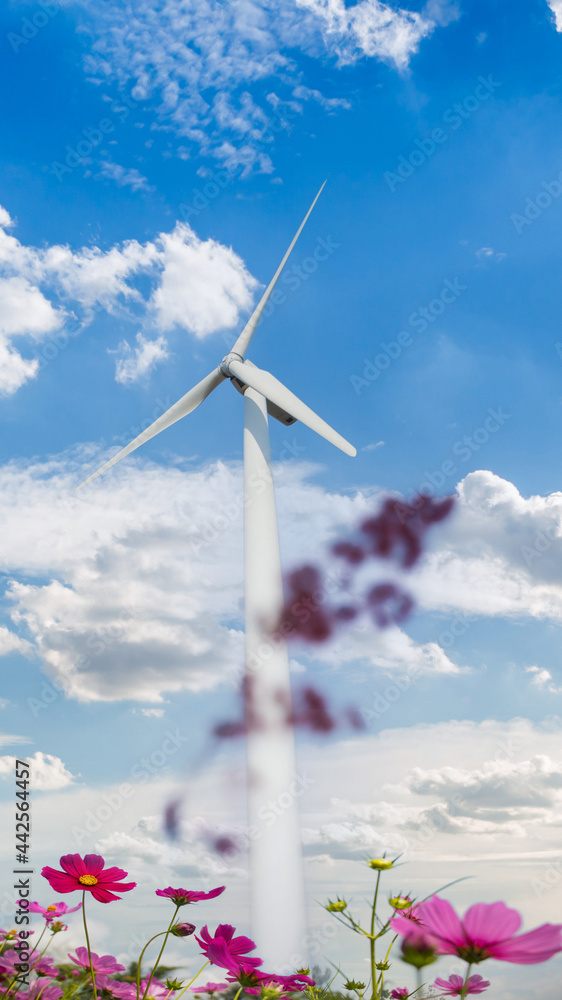 Obraz premium Windmills for electric power production. Wind Turbine farm producing green energy. Protection of nature. Wind Power Renewable Energy Plant.