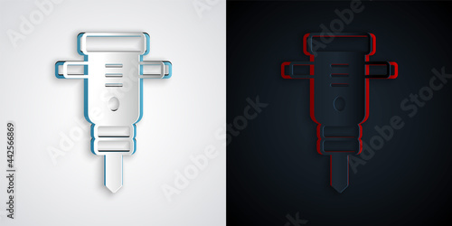 Paper cut Construction jackhammer icon isolated on grey and black background. Paper art style. Vector