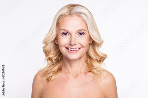 Portrait of attractive cheerful healthy grey-haired woman with smooth perfect skin lifting effect isolated over white color background