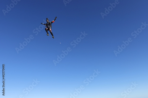 Skydiving. Solo girl is flying in the sky © Sky Antonio