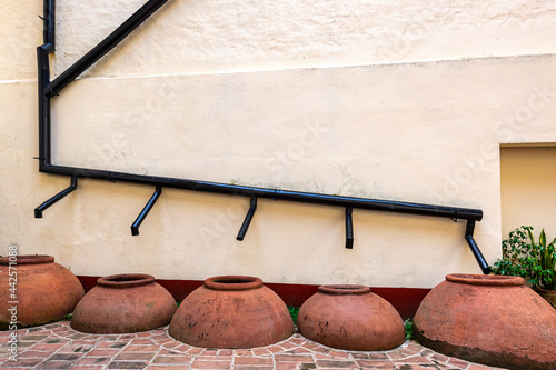 Colonial rainwater gathering system, Camaguey, Cuba photo