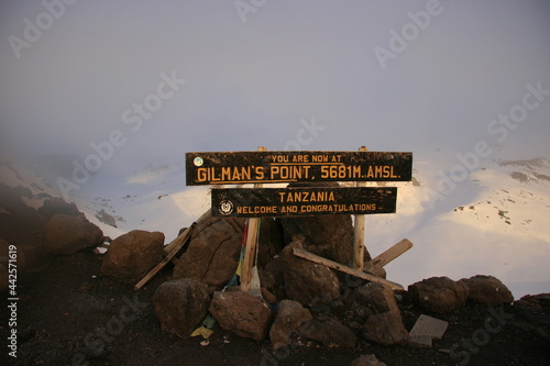 Gilmans Point sign at summit of Mount Kilimanjaro, Tanzania photo