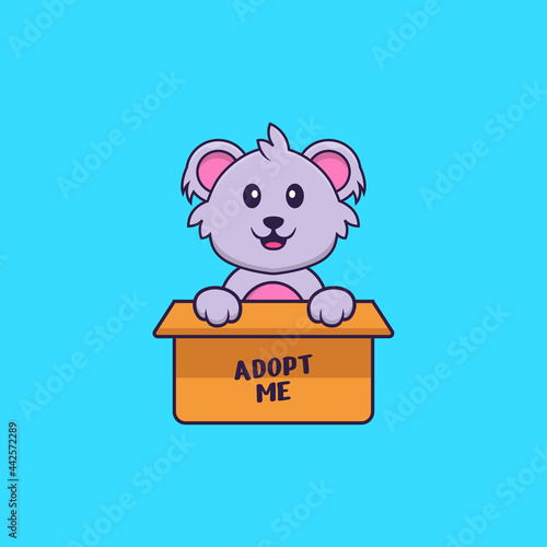 Cute koala in box with a poster Adopt me. Animal cartoon concept isolated. Can used for t-shirt, greeting card, invitation card or mascot. Flat Cartoon Style