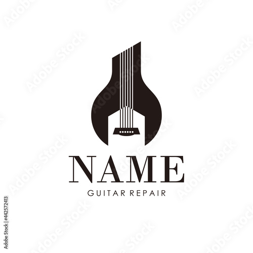 wrench with guitar strings for guitar repair logo design