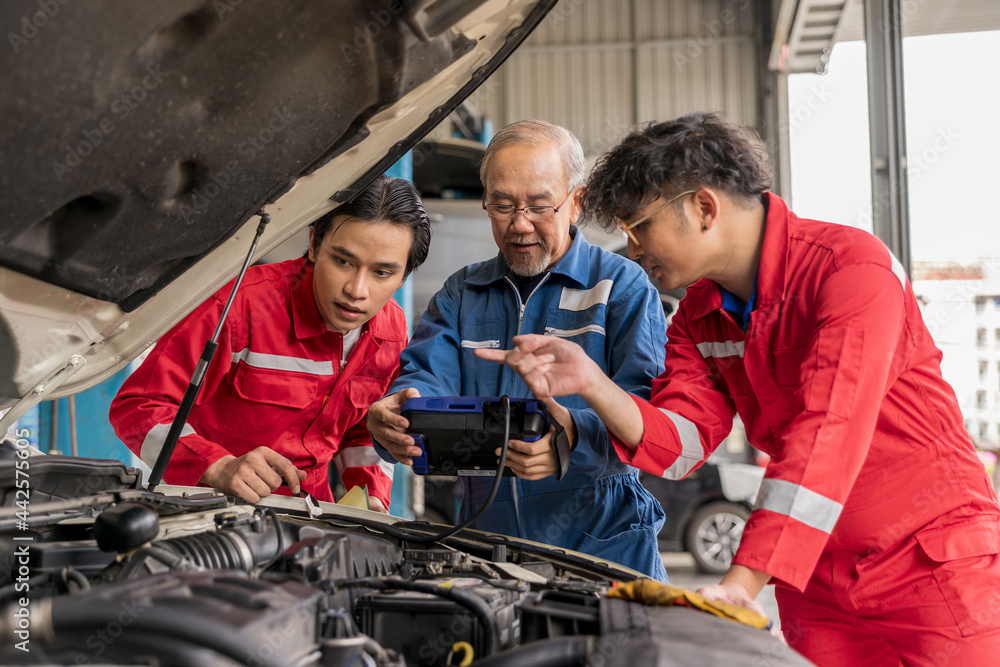 Senior professional mechanic use an obd2 car diagnostics device scanner to interpreting automotive error codes. Elderly vehicle mechanic maintenance the engine in garage workshop. Auto repair service
Senior professional mechanic use an obd2 car diagnostics device scanner to interpreting automotive error codes. Elderly vehicle mechanic maintenance the engine in garage workshop. Auto repair service