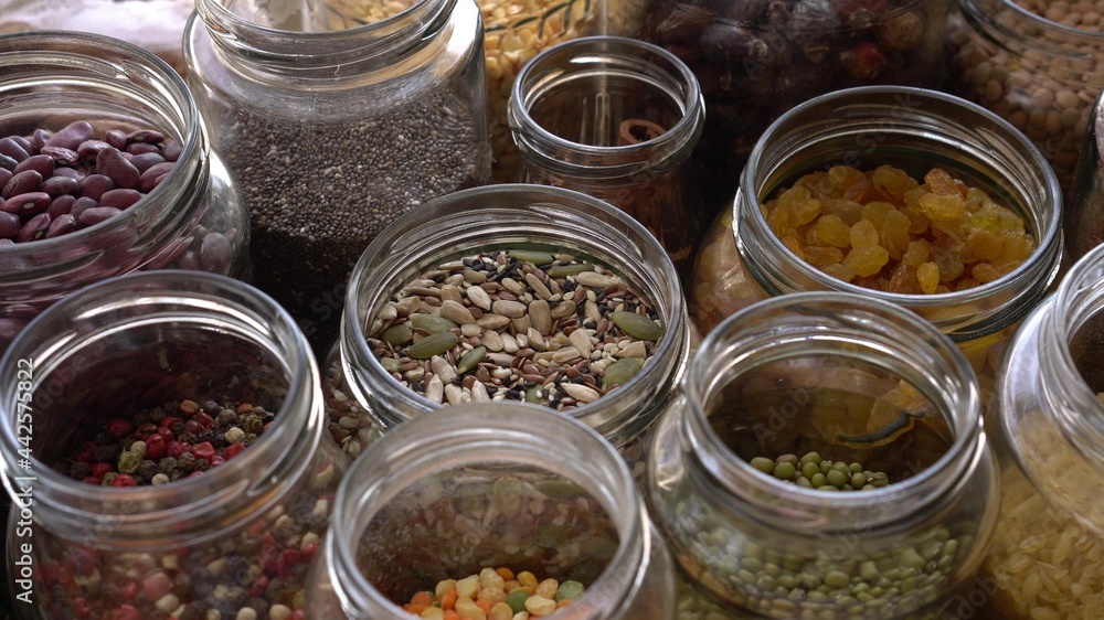 Grocery stock, food reserve. Glass Cereal Jars. Zero Waste Shopping. Shop in Bulk. Buying and Storage Food Package free. Reduce packaging waste. Healthy eating Grocery stock, food reserve. Glass Cereal Jars. Zero Waste Shopping. Shop in Bulk. Buying and Storage Food Package free. Reduce packaging waste. Healthy eating