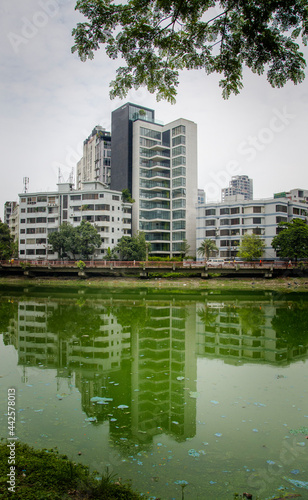 Buildings over the lake   Lakeside Apartment