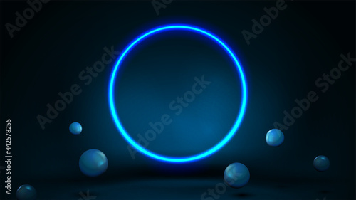 Blue scene with realistic bouncing spheres and neon ring.
