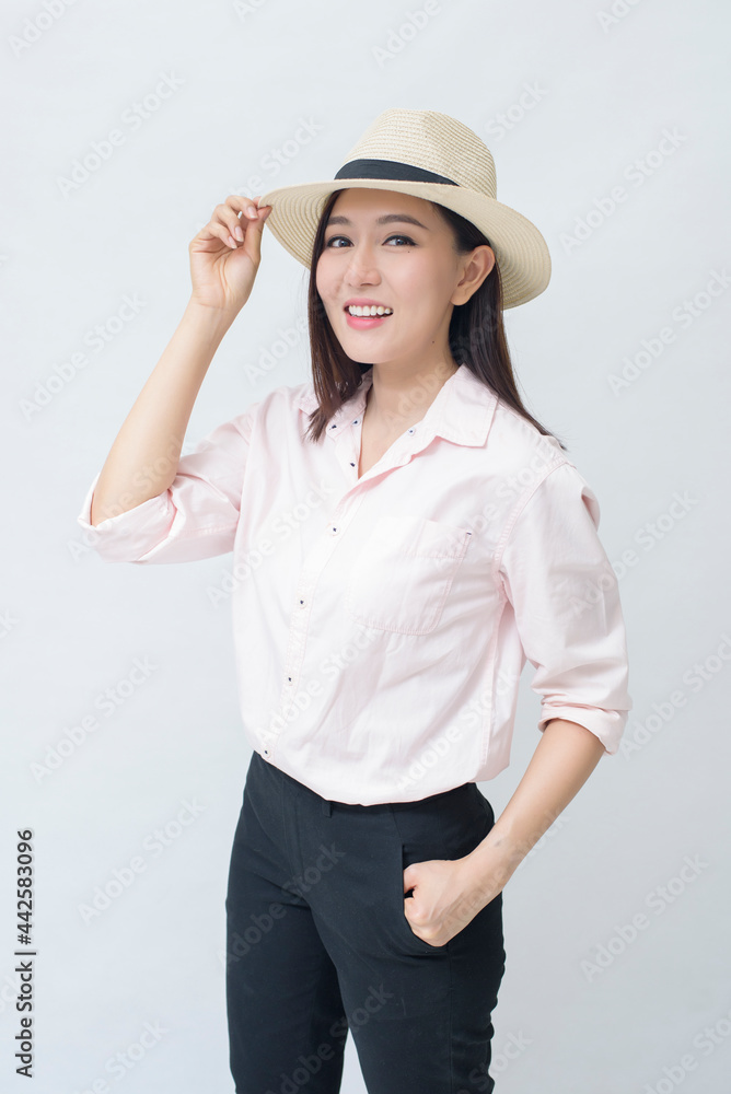 a joyful traveling woman is going on holiday on white background studio, travel and tourism concept a joyful traveling woman is going on holiday on white background studio, travel and tourism concept