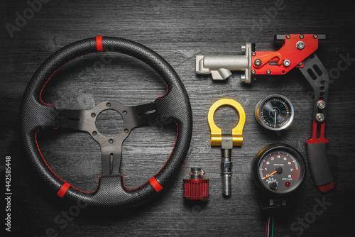 Sport car tuning gear concept flat lay background with copy space. Motorsport automobile equipment.