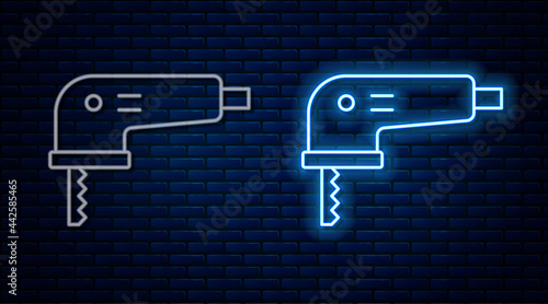 Glowing neon line Electric jigsaw with steel sharp blade icon isolated on brick wall background. Power tool for woodwork. Vector