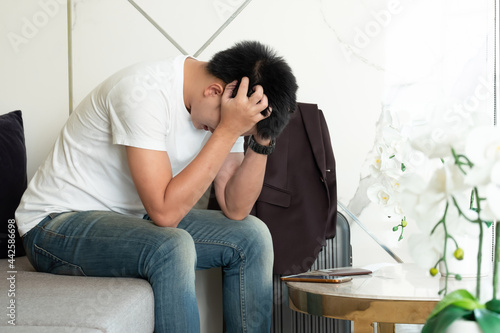 A mentally ill man in white clothes asian men