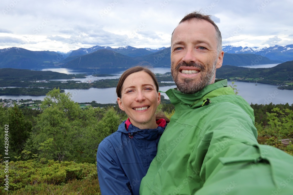 Tourist couple in Sunnmore, Norway