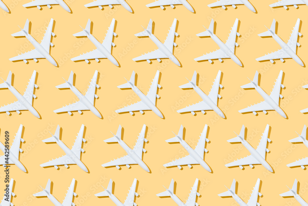 top view of pattern of white airplanes on a yellow background. Travel and summer concept. 3d illustration top view of pattern of white airplanes on a yellow background. Travel and summer concept. 3d illustration