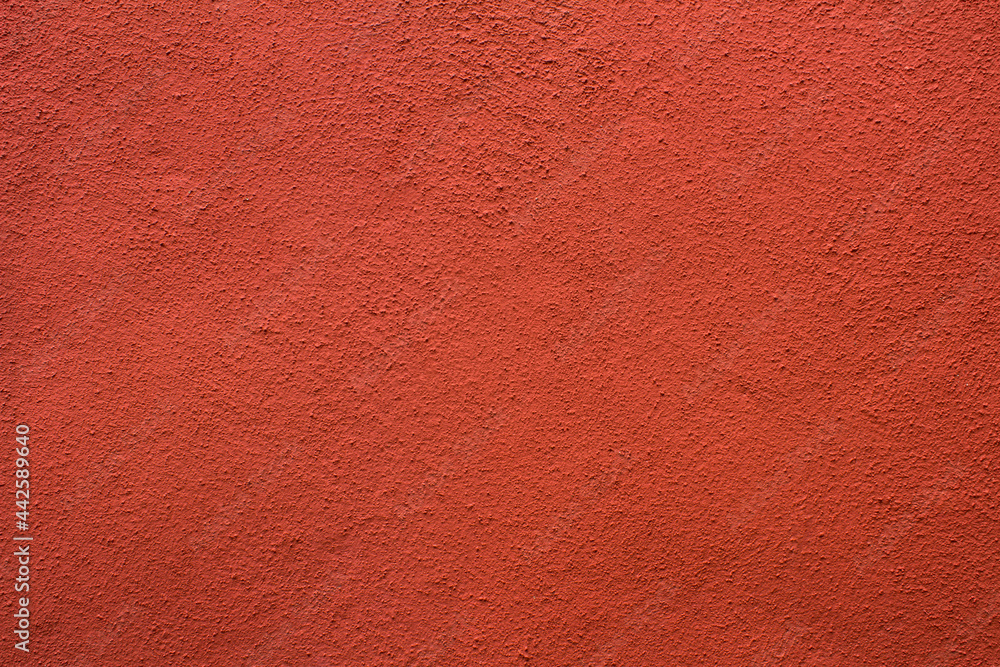 Natural background. Red or terracotta concrete wall. Copy space. Natural background. Red or terracotta concrete wall. Copy space.