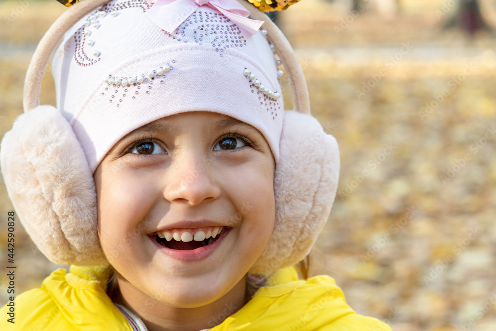 little cute girl in autumn park with color fallen leaves little cute girl in autumn park with color fallen leaves