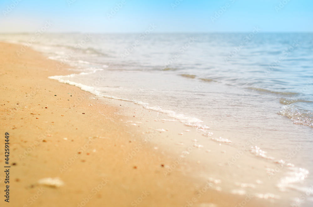 Summer sun sandy beach with blue sky. Summer background. Copy space. Sea view. Summer sun sandy beach with blue sky. Summer background. Copy space. Sea view.
