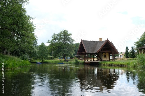 A wooden house by the river Zbrzyca, a resting place for canoeists. Laska, Bory Tucholskie, Poland