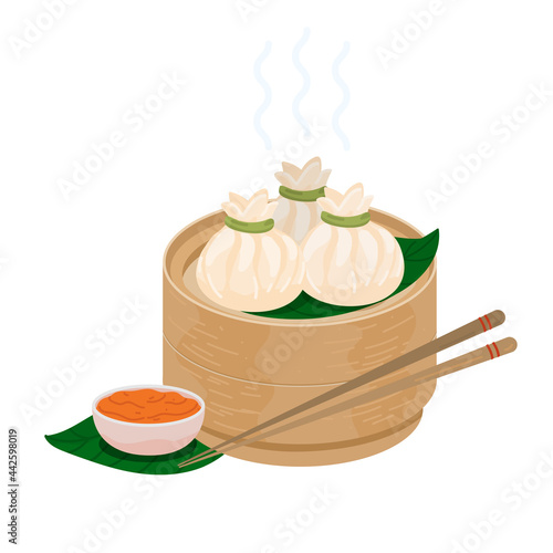 Xiaolongbao. Soup dumplings. Chinese steamed bun baozi. Steamed xiaolong bao served in a traditional steaming basket. Xiaolong momo mantou kind of dimsum. 