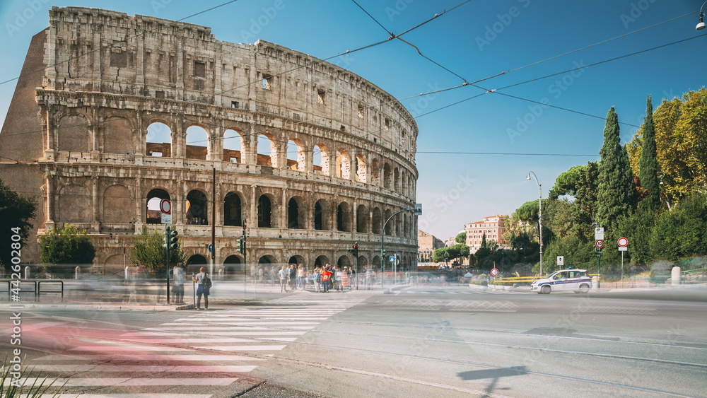 Rome, Italy. Colosseum. Traffic Near Flavian Amphitheatre. Famous World Landmark. UNESCO