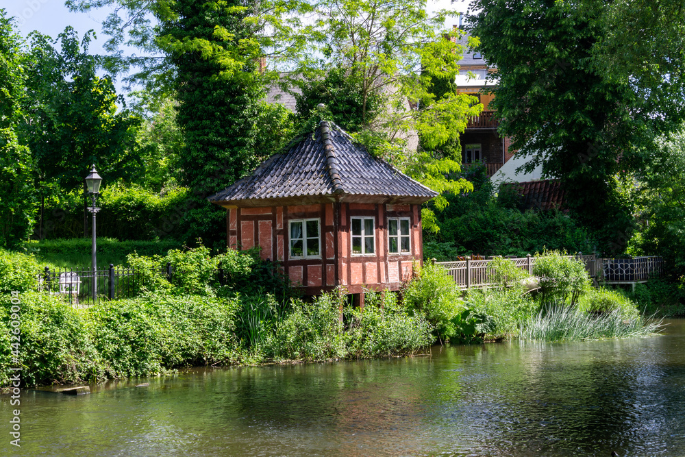 picturesque little garden cottage on the banks of the Odense River
