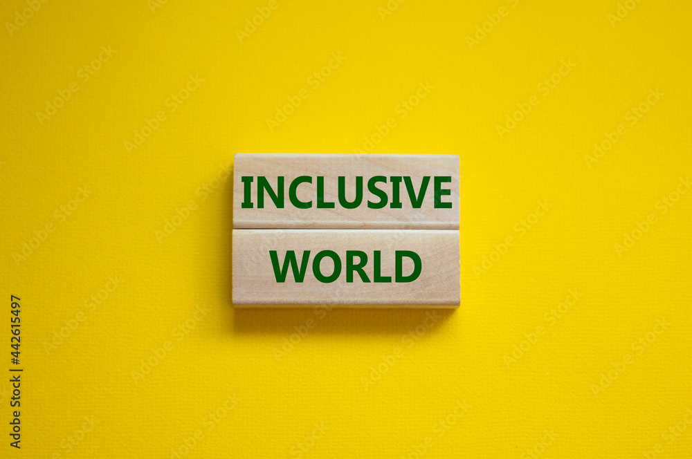 Inclusive world symbol. Wooden blocks with words Inclusive world on beautiful yellow background. Business, inclusive world concept. Copy space. Inclusive world symbol. Wooden blocks with words Inclusive world on beautiful yellow background. Business, inclusive world concept. Copy space.