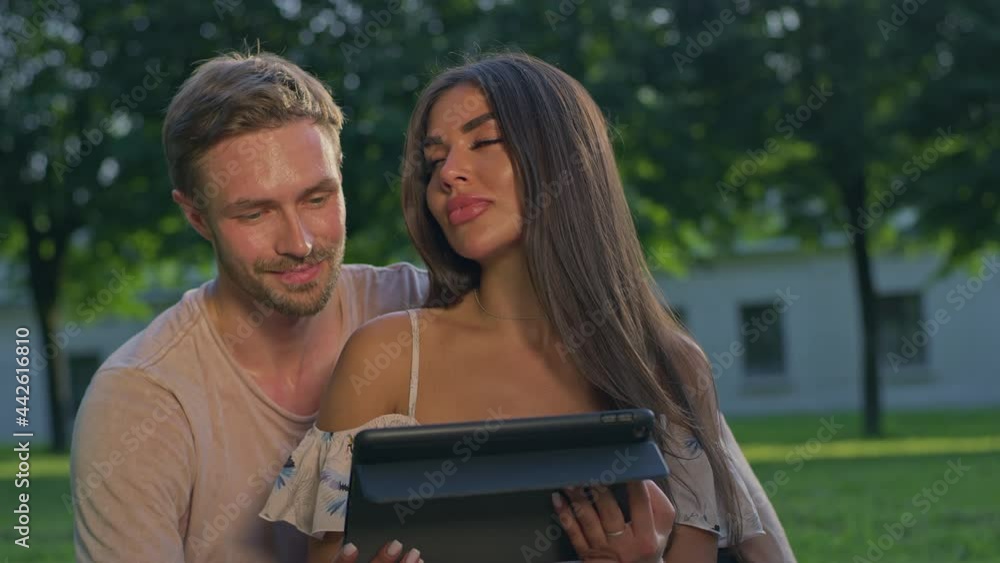 Super beautiful couple chatting on laptop Super beautiful couple chatting on laptop