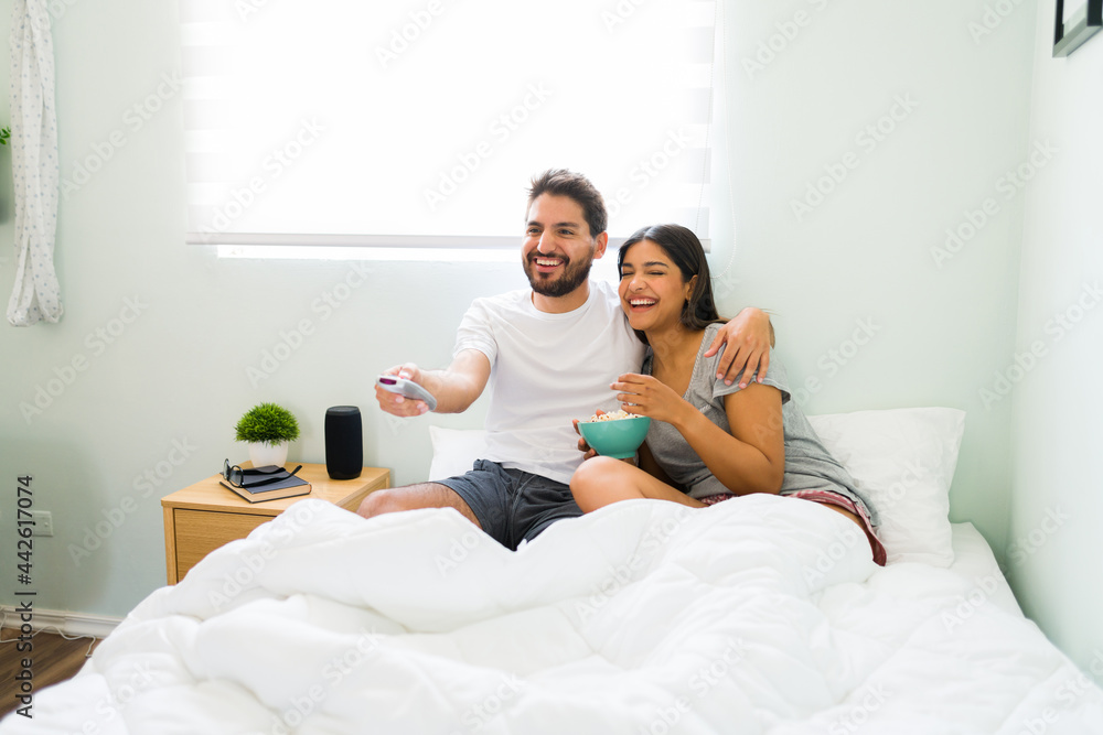 Boyfriend and girlfriend enjoying a movie night Boyfriend and girlfriend enjoying a movie night